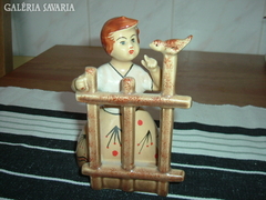 Kislány kismadárral égetett cserép fugurális szobor