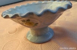 Old porcelain serving bowl with flower pattern