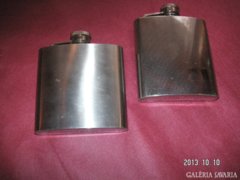 Brandy bottles, made of stainless steel, approx. They have a capacity of 2 Dl. In perfect condition.
