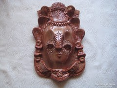 Mudi sign, ceramic wall mask