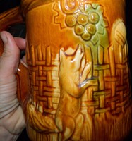 Antique glazed ceramic beer mug with fairy tale scene: fox and the moon
