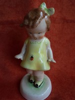 Bodrogkeresztúri sárga ruhás katicás kislány figura. 