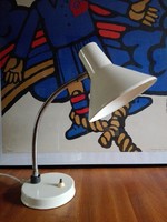 Retro, cream-colored, metal table lamp.