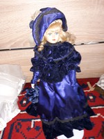 The old porcelain doll's 38cm flawless dress is also old, rare and beautiful