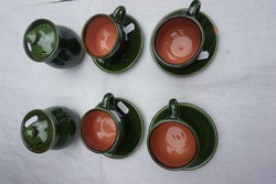 Turtle green moccasian cups with sellers underlay.