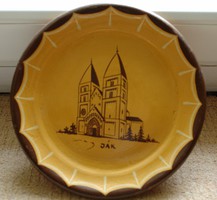 Glazed wall plate depicting the church of Ják