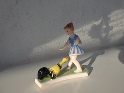 Applied art marked ceramic with zsg mark: little girl feeding a hen