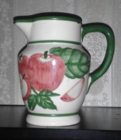 Glazed porcelain jug with a fruit pattern
