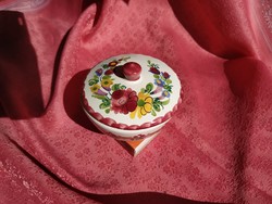 A beautiful spice holder with a flower pattern