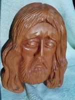 Wooden carved head, wall decoration.