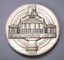 NDK-érme Brandenburgi kapu Berlin.