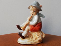 Boy playing the flute, antique hand-painted marked porcelain