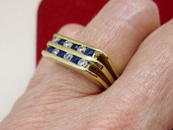 Elegáns 14kt-os aranygyűrű  fehér és kék kövekkel