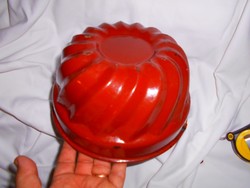 Old confectionery tool in enamel dumpling form