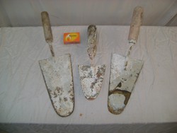 Three pieces of old mason's tool - trowel