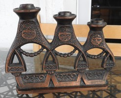 Industrial three-pronged figural bronze candlestick
