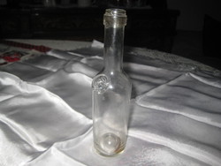 Hagyományos , antik , fúvott üveg , hitelesített, oldalába belenyomva , 0,1 l és 40 x 155 mm mm