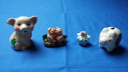 Four lucky ceramic pigs