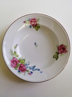 Wall plate with rose pattern