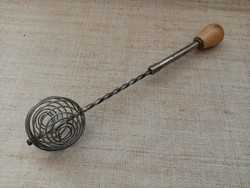 Old wooden handle spring whisk in usable condition
