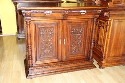 Tin German, richly carved chest of drawers made of oak