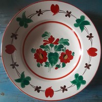 Old granite wall plate with flower pattern