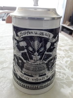 German beer mug with brau-union engraving on top.