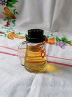 Korsó alakú mini parfümös üveg (Pacsulival töltve)