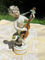 Antik nápolyi porcelán zenélő puttó