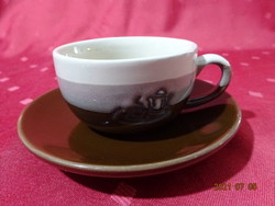 Glazed ceramic coffee cup + placemat. He has!