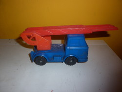 Old small plastic crane toy truck