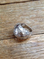 Silver ring with crystals and interior decoration