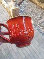 The best teacher is labeled half-liter ceramic mug-tile city