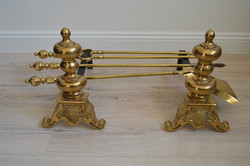 Antique English brass fireplace with fire tool