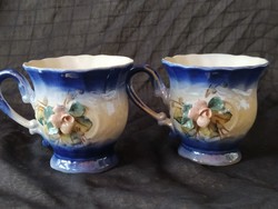 Couple with antique faience coffee cup