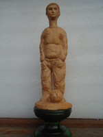 A ceramic figure depicting a terracotta football player is perhaps (grosics) 22 cm tall