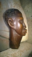 Great wood sculpture, wood carving - profile of a Negro man