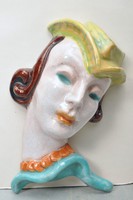 Art deco female wall mask, lady in yellow hat, very beautiful.