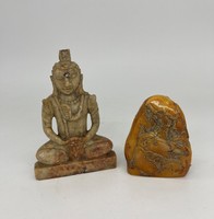 Asian Chinese carved stone buddha statue and yellow 