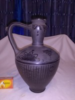 Black ceramic rattling jar - marketplace, marked