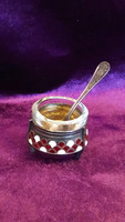 Old gilded silver-plated caviar with spices in a small spoon