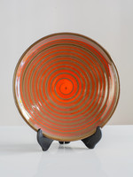 Retro wall plate with spiral pattern