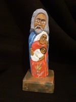 Naive wood carving, painted sacred family