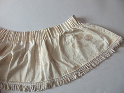 Thick drapery with a special Art Nouveau pattern and fringe