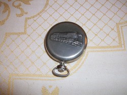 Molnija's old nice pocket watch with a locomotive on the back