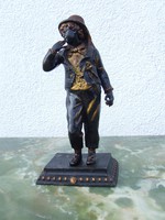 Metal statue of black boy