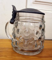 Glass jar with tin top