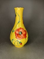 Extra rare herend pate sur pate in a poppy vase on a yellow fond background.