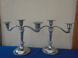 A pair of very solid candlesticks in thick silver