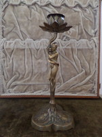 Art Nouveau turn-of-the-century female figure in a copper candlestick